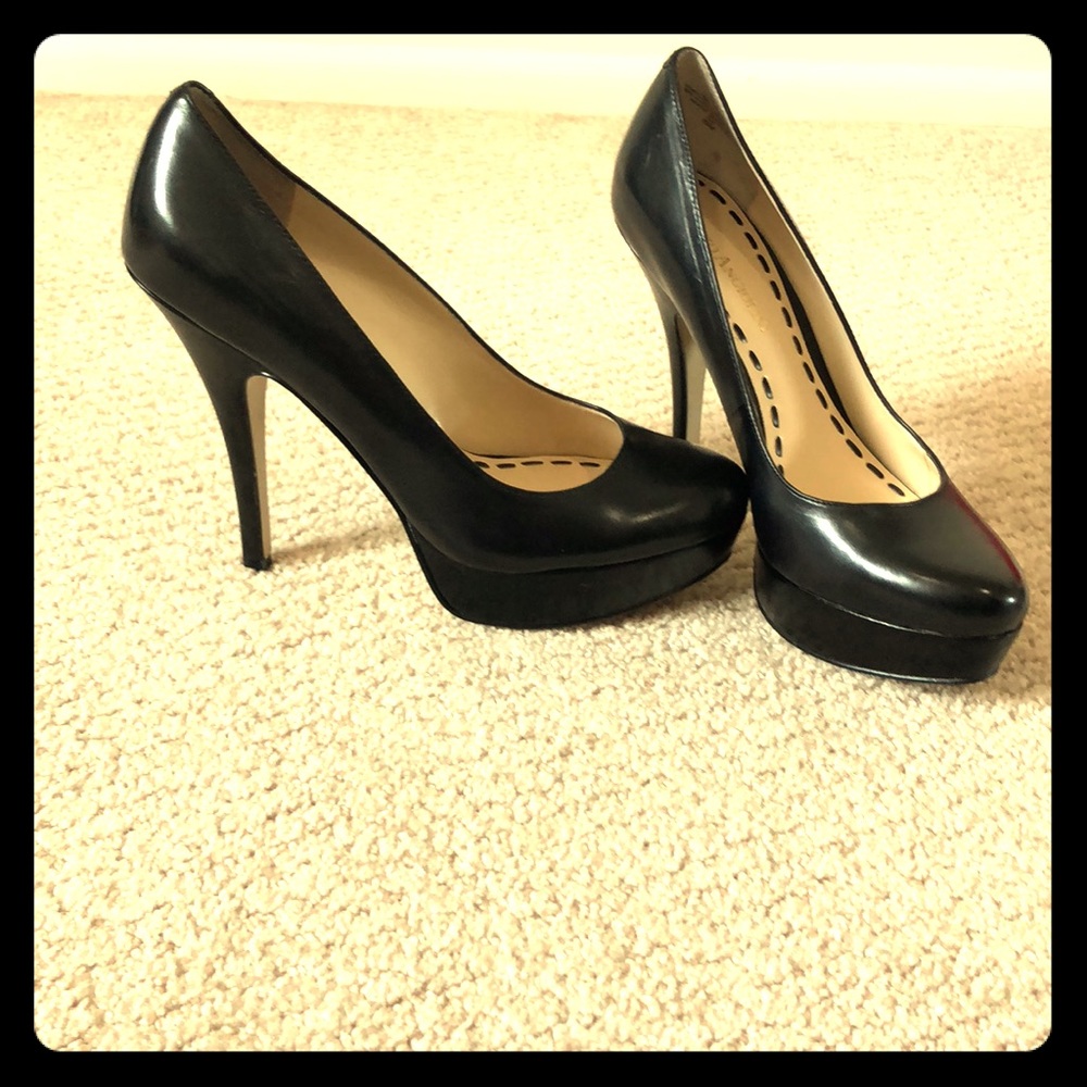 Enzo Angiolini platform pumps.